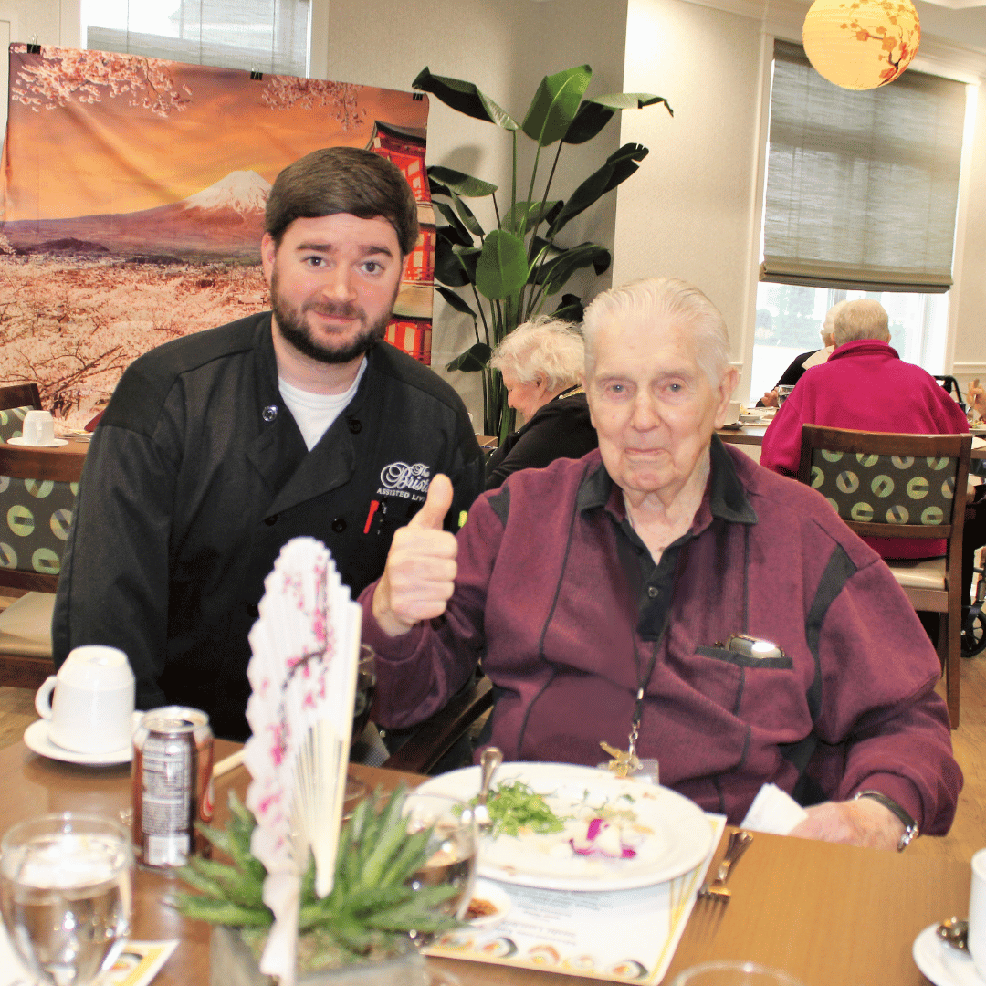 chef and grandgather at table