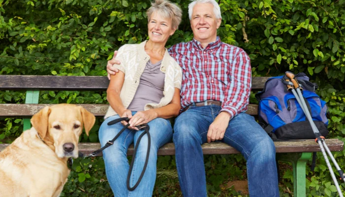Senior couple taking a break on a bench.