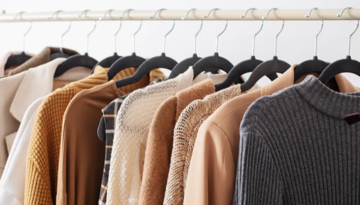 clothes on hangers in closet