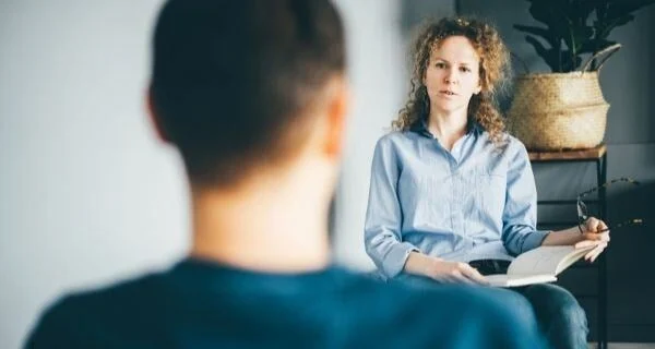 Gentleman working with a woman social worrker