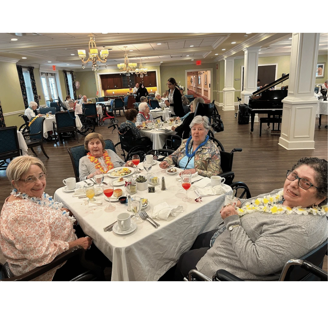 Residents at The Bristal at Lake Grove Luau Luncheon