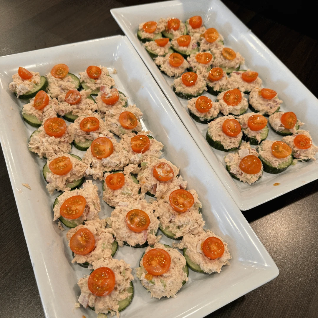 Two Beautifully Prepared Trays of Healthy Tuna Salad Cucumber Bites, prepared by the Food Prep Club at The Bristal at Wayne