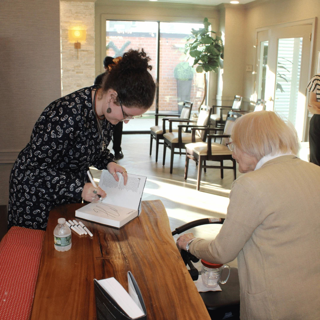 Author Margaret Hall autographed her book for residents as well.