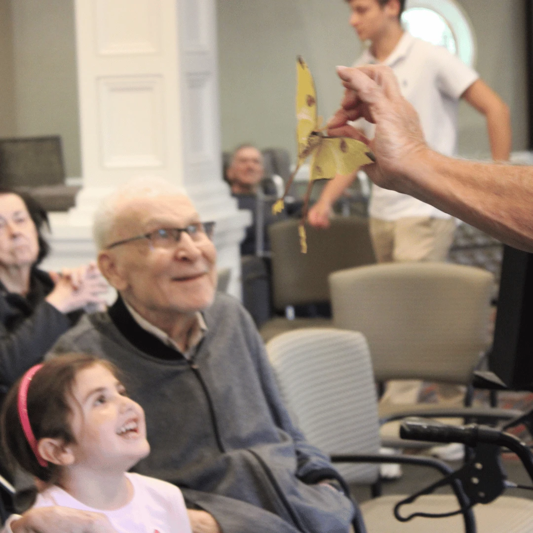 A butterfly experience at The Bristal at Armonk captivated residents and family members.