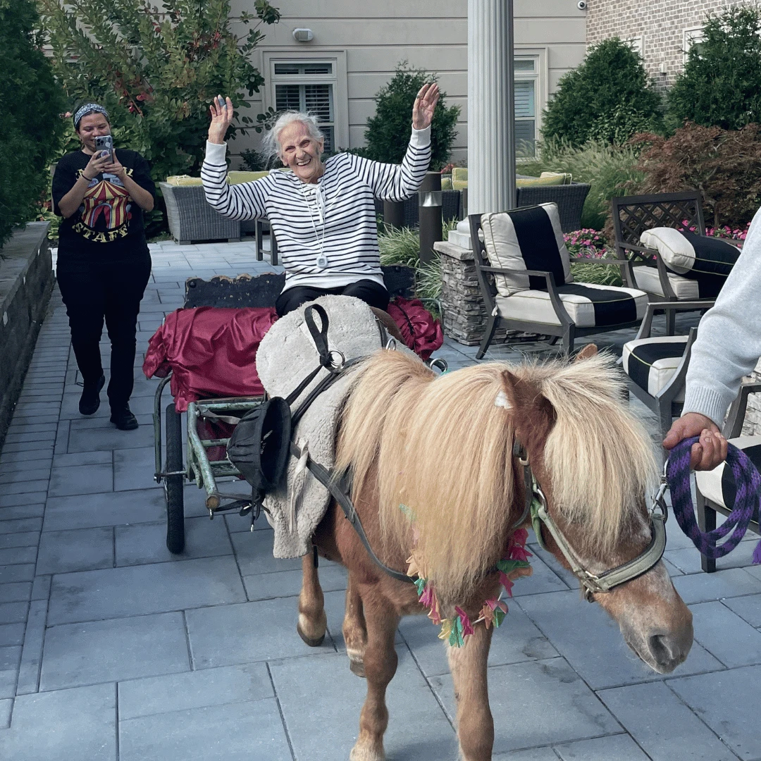 Residents enjoyed the pony ride and petting zoo, highlights of the Grandparents Day Carnival.