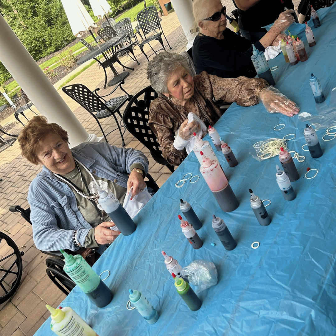 A groovy time tie-dying at The Bristal at Lake Grove to celebrate Hippie Day 2024!