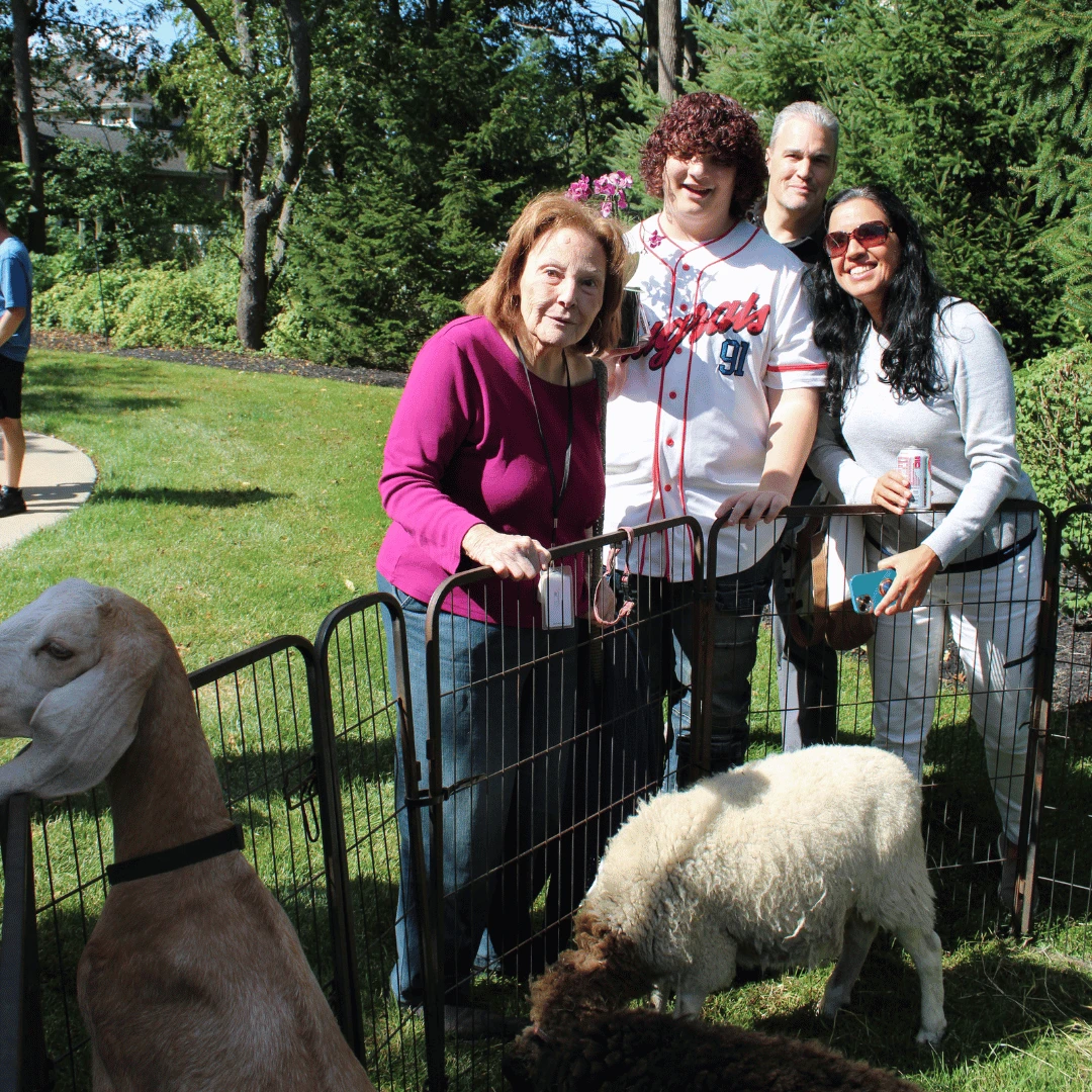 Residents at The Bristal at Lake Grove invited their families to a petting zoo as part of the Grandparents Day celebration.