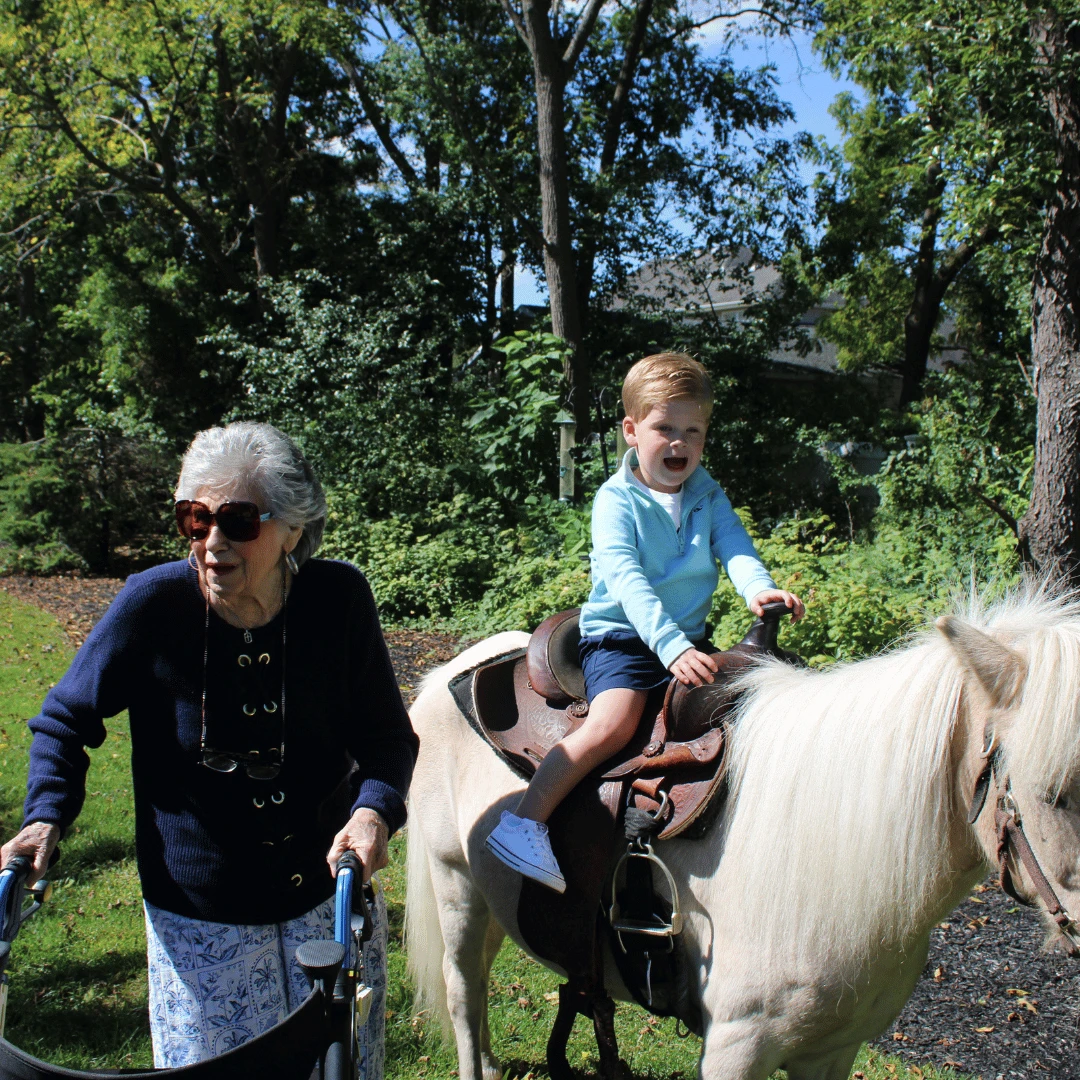 A pony ride was one of the main attractions at the Grandparents Day Carnival in Lake Grove.