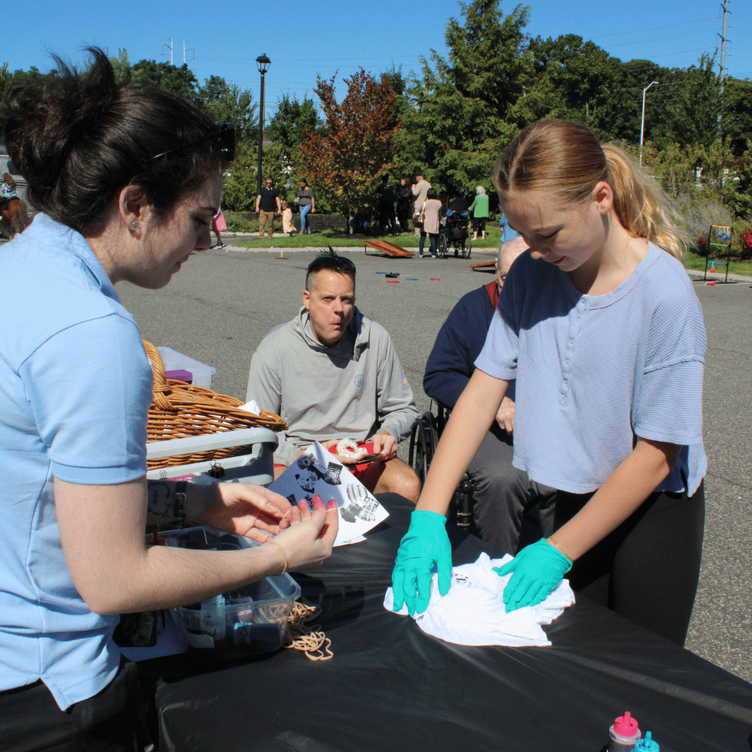 A tie-dye tee shirt activity was enjoyed by residents and family members alike. 