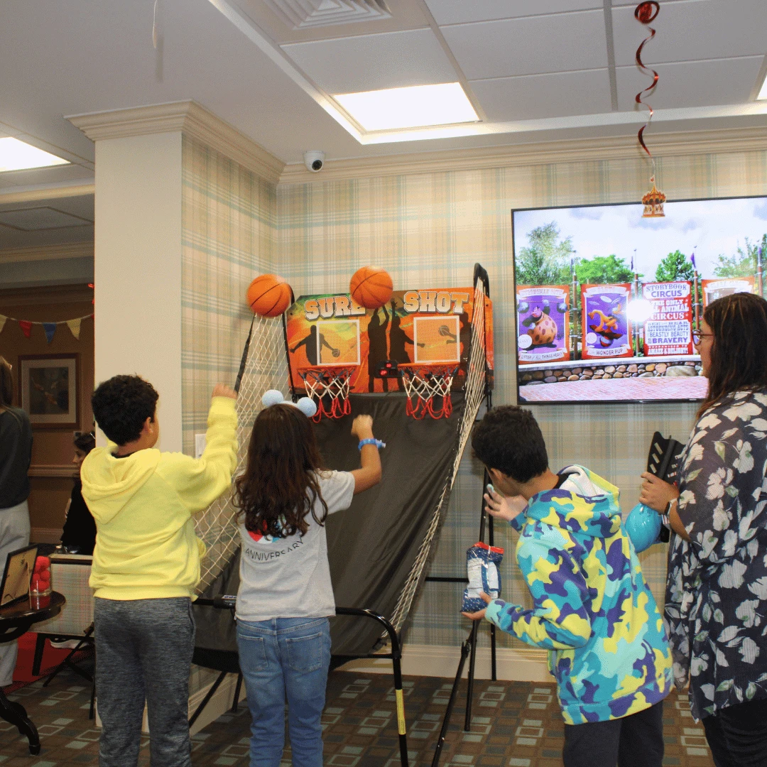 Residents cheered on their grandchildren playing games like basketball shoot-out at The Bristal.