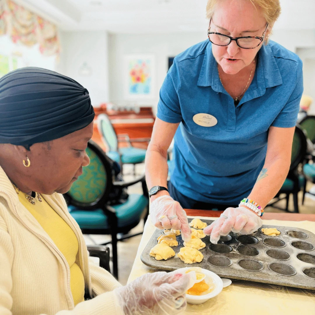 Assisted living team and residents joined together at North Woodmere to create desserts in baking club.