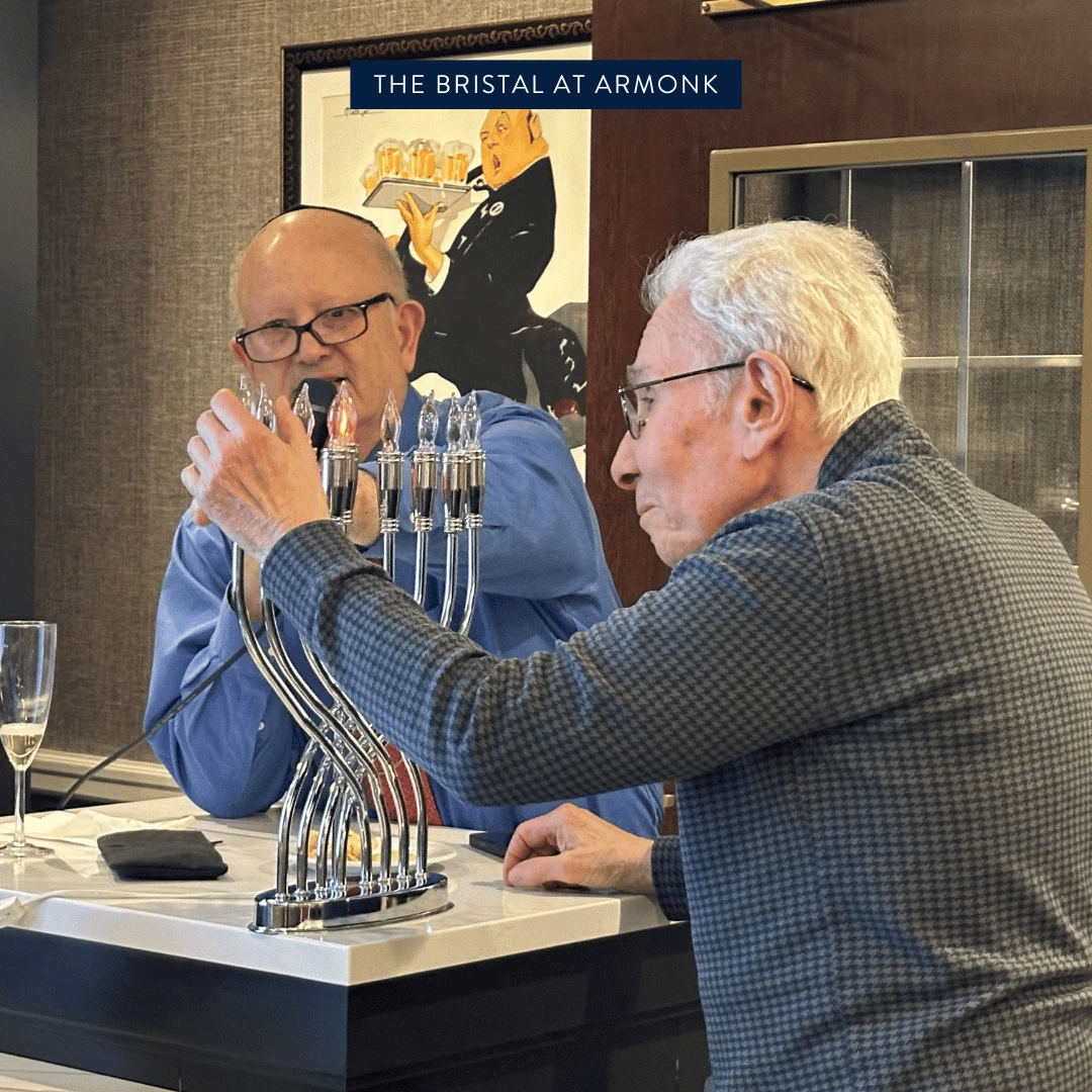 Resident of Armonk lights the menorah to mark the first day of Hanukkah