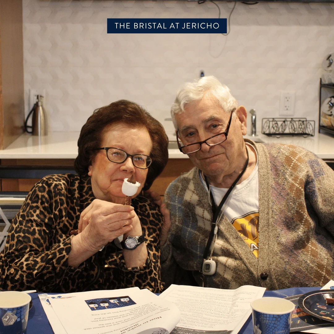Residents celebrating Hanukkah at The Bristal at Jericho