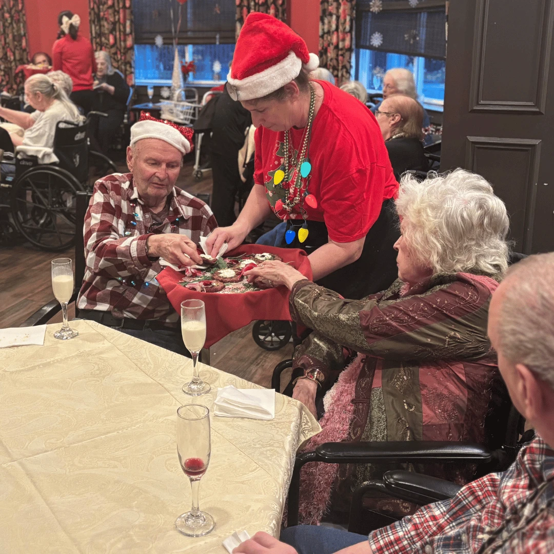 Residents enjoyed holiday cookies while dressed in festive attire.