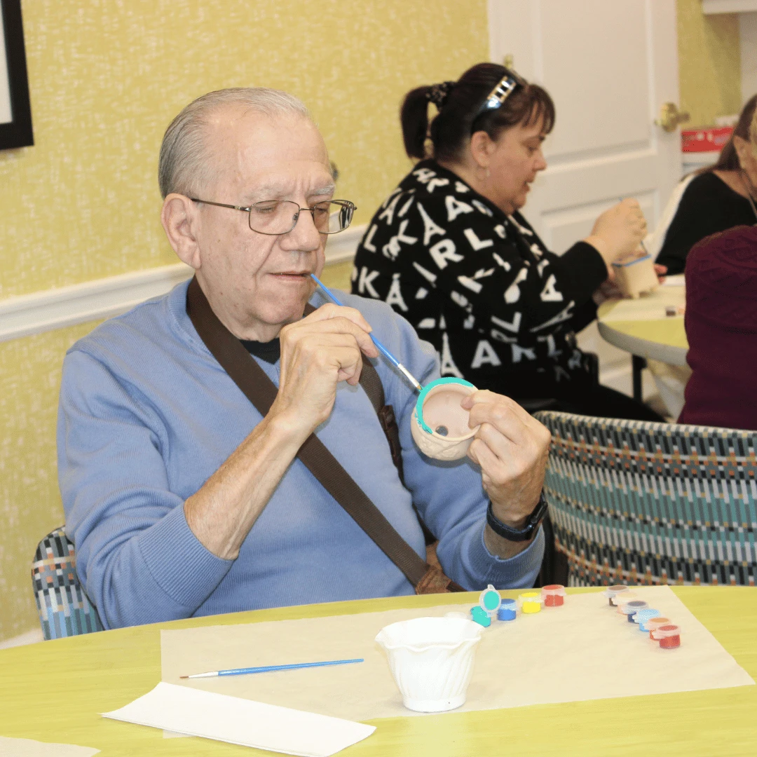 Somerset residents paint succulent pots for National Houseplant Day.