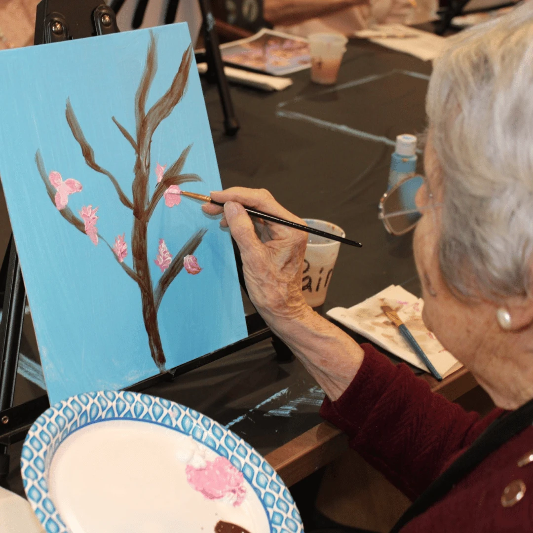 Residents painted their own cherry blossoms in honor of the Cherry Blossom Festival