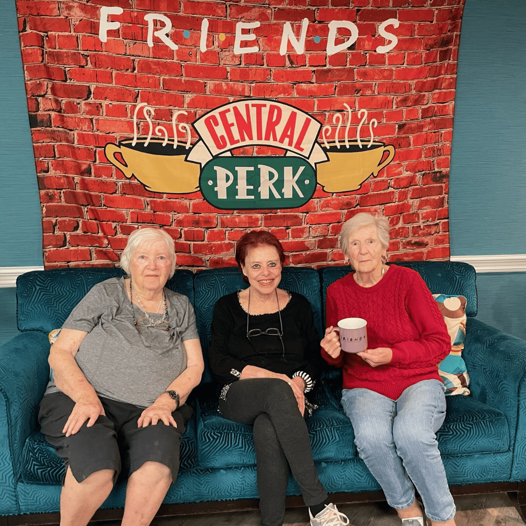 The history of film would not be complete without discussing the history of TV, as these resident pose in front of a banner for Friends