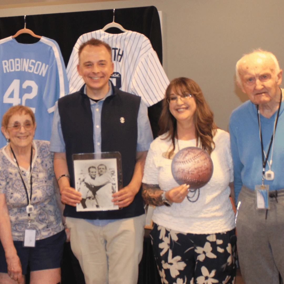 Residents posed for pictures with baseball historian Andrew Lilley at The Bristal at Somerset