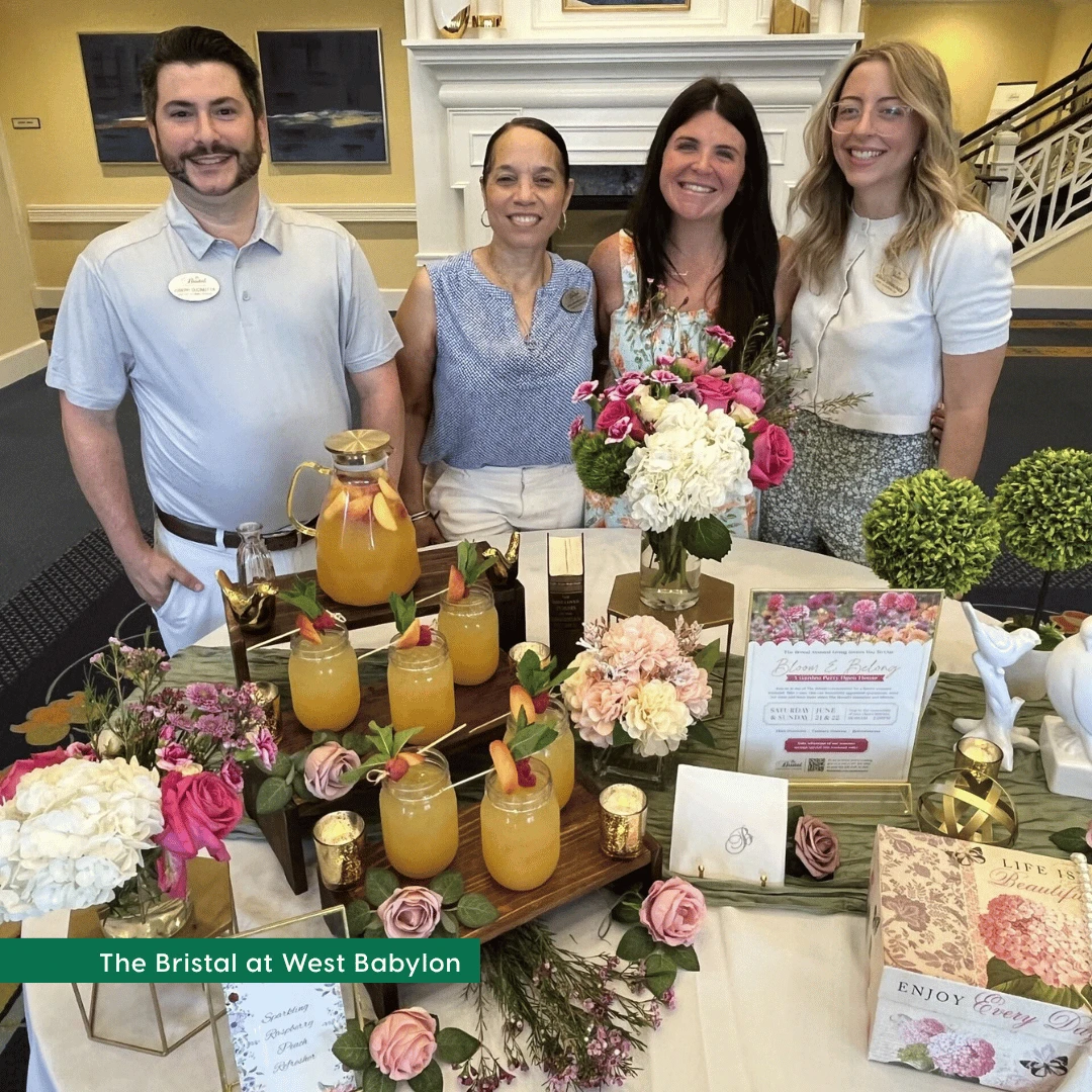 The Bristal at West Babylon welcomed guests with an elegant spread, including summer cocktails and floral displays
