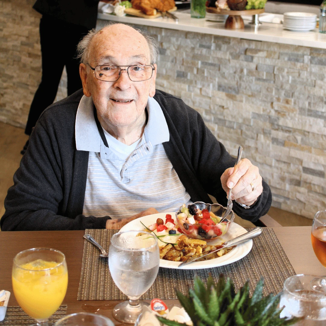 Senior man dines at the Bistro for a Parisian breakfast