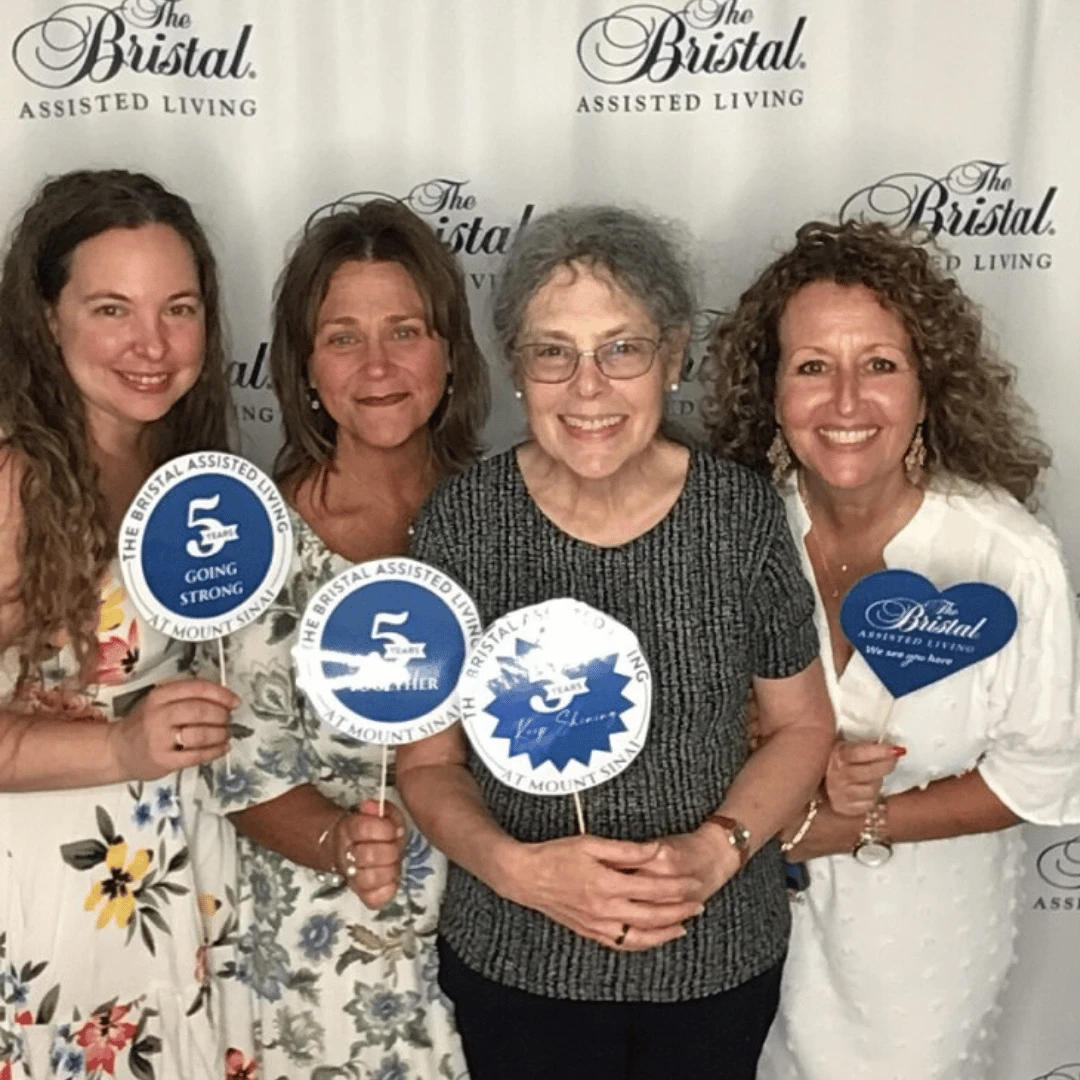 Team members at The Bristal at Mount Sinai celebrate their community's five-year anniversary
