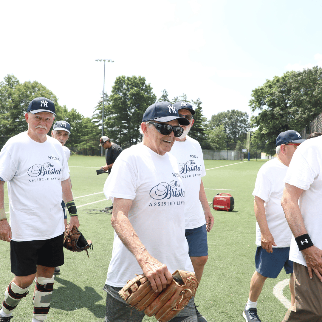 Players wore The Bristal jerseys and Mets or Yankees caps