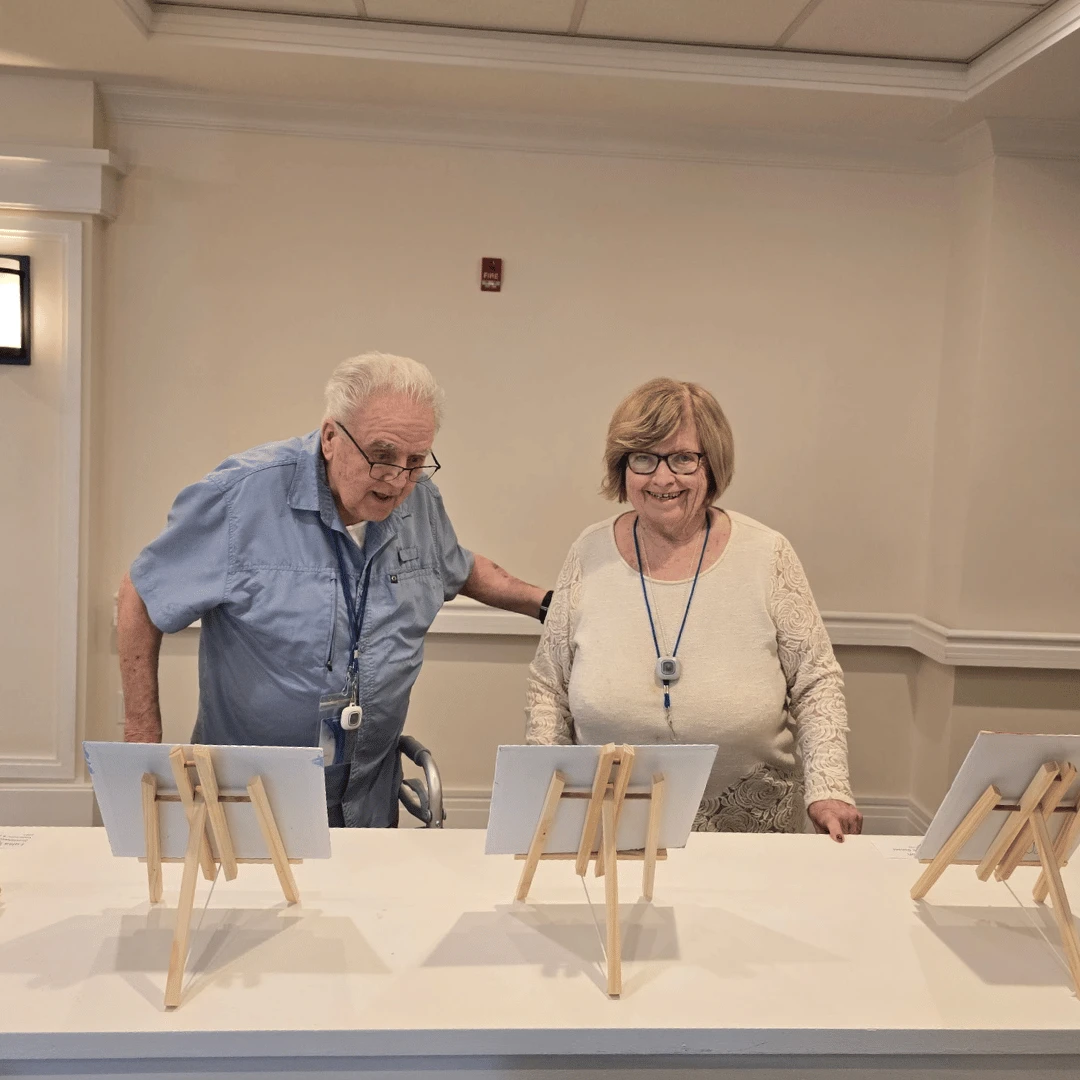 Residents of The Bristal at White Plains admire the neighboring resident's work