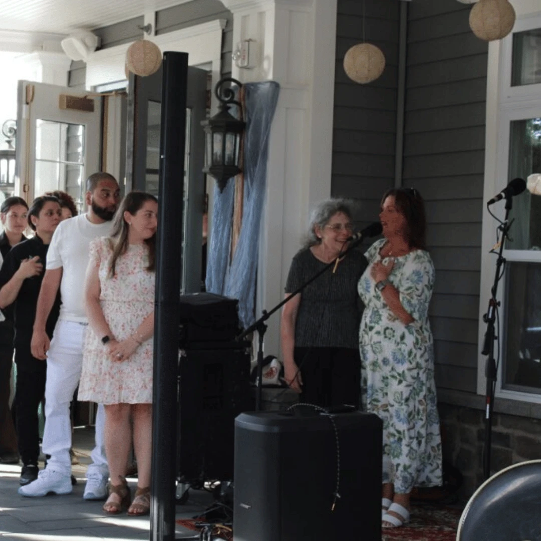 Executive Director at The Bristal at Mount Sinai Karen Caroppoli speaks at the anniversary event