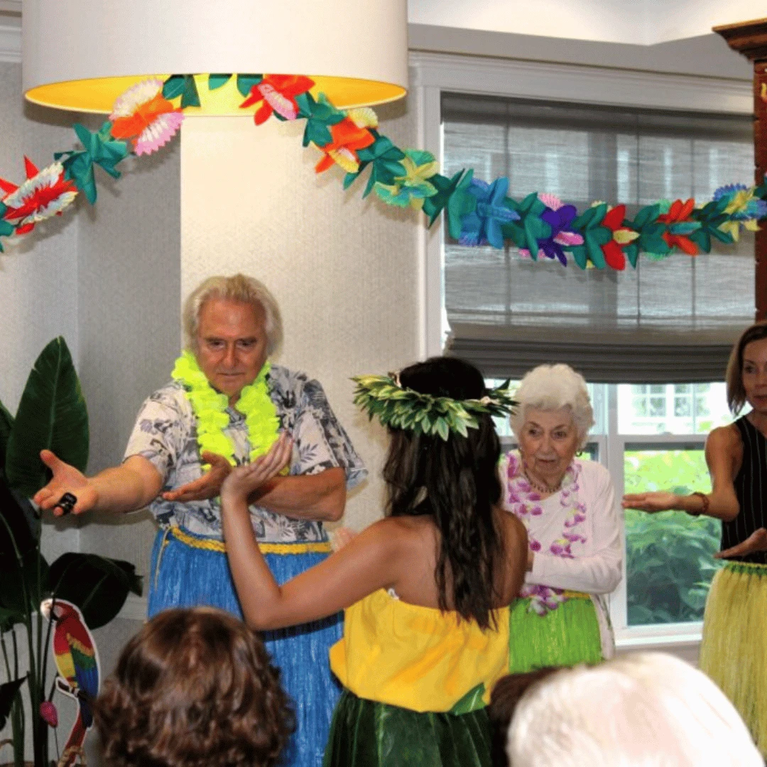 Residents performed for each other after learning the meaning behind traditional luau dance moves