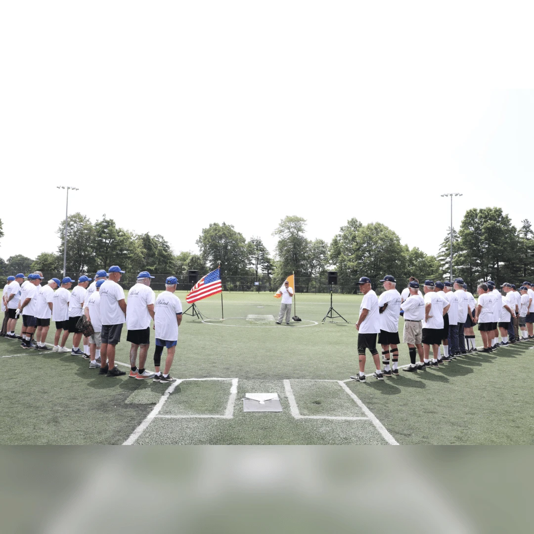 Players lined up before the start of the All Stars Senior Softball game in Nassau County NY