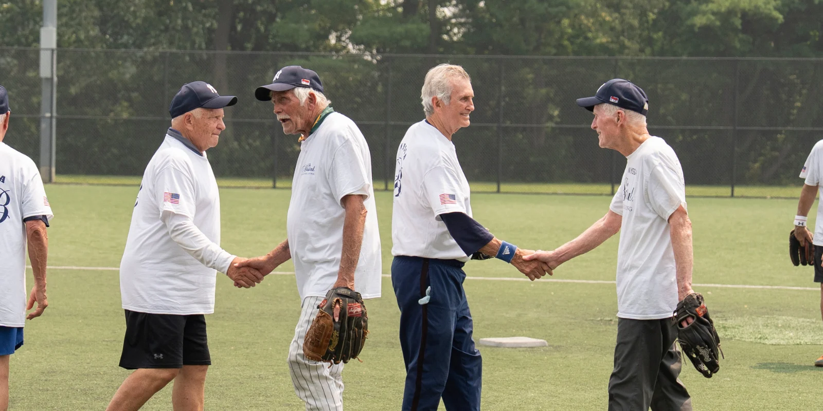 The Bristal All-Stars 2026 Senior Softball: players shake hands after the game