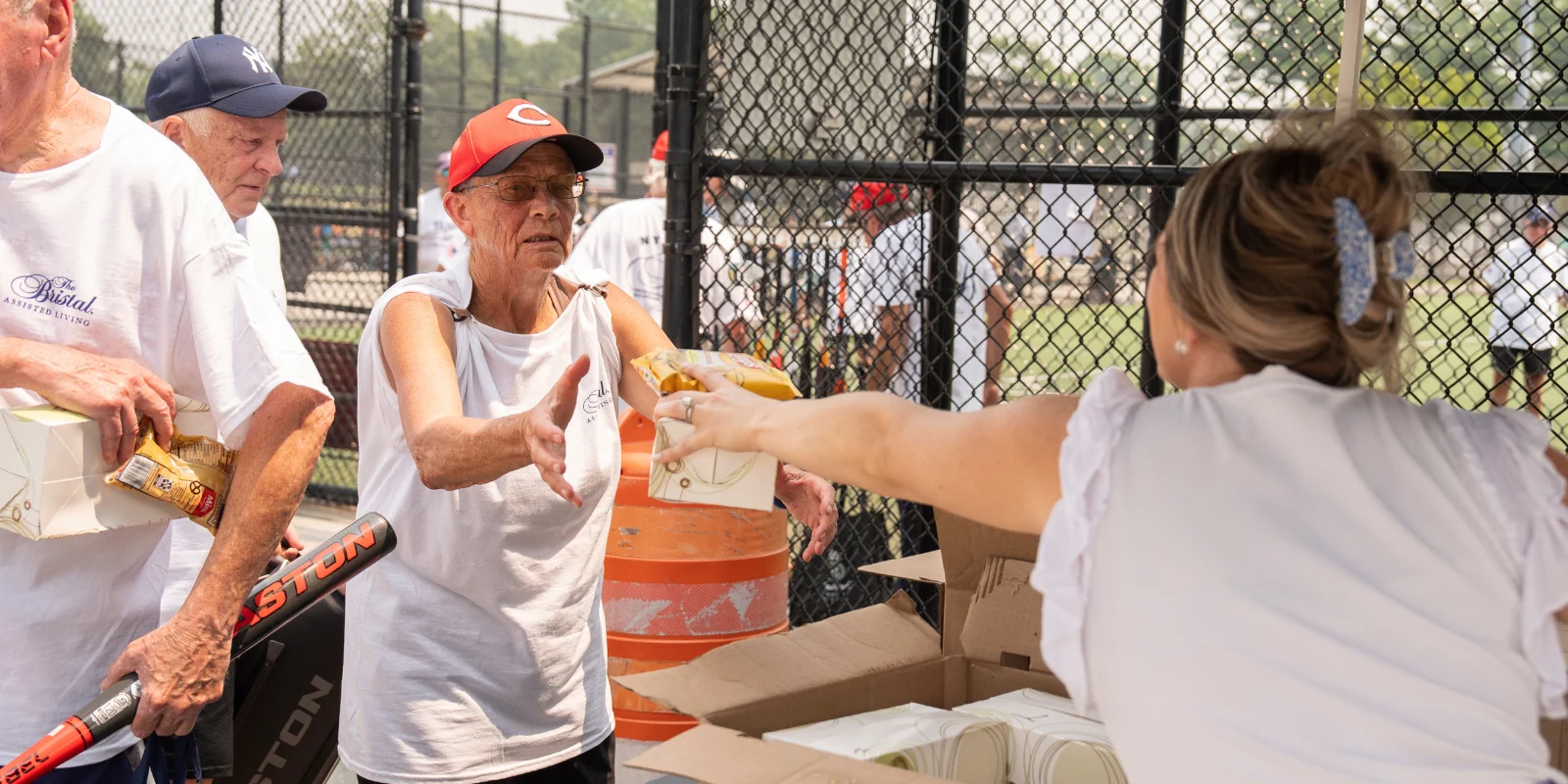The Bristal All-Stars 2026 Senior Softball: players receive a boxed lunch