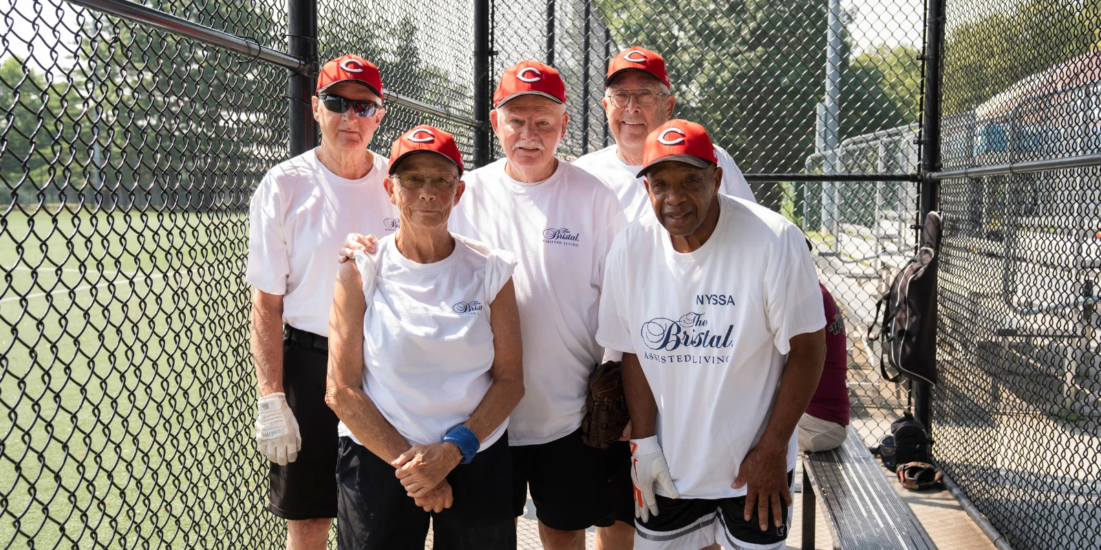 The Bristal All-Stars 2026 Senior Softball: players pose in the dug-out