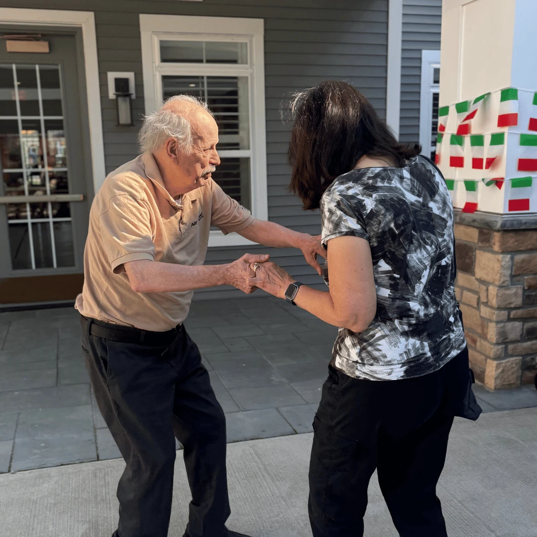 Residents at The Bristal at Bethpage dance at the San Gennaro inspired celebration