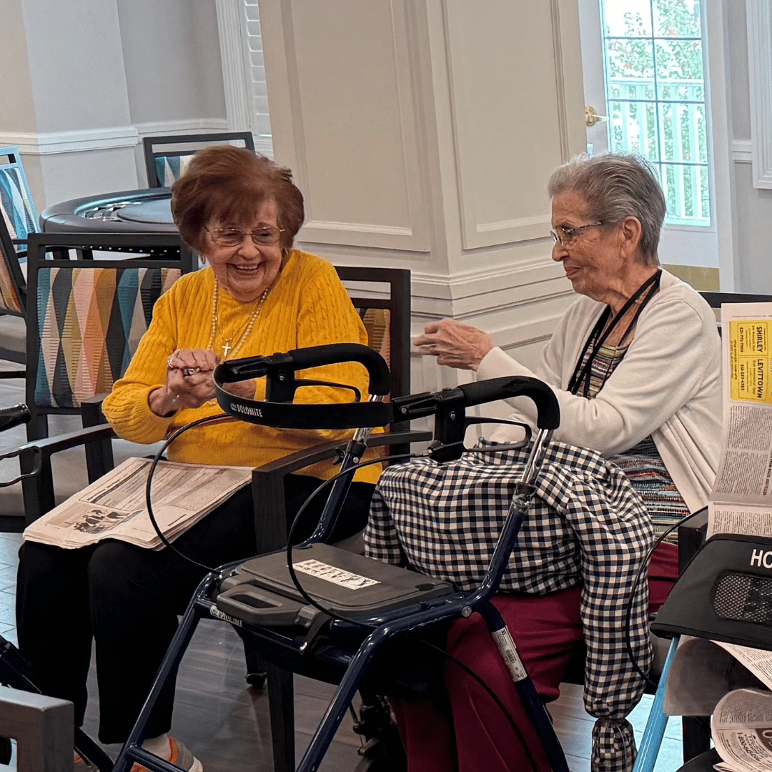 Two residents at The Bristal at Sayville who participated in the Scarecrow Making Contest