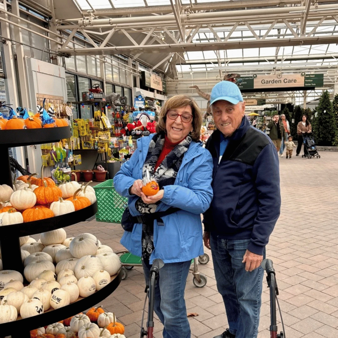 Residents from The Bristal Assisted Living at Lynbrook choose pumpkins to decorate for the season