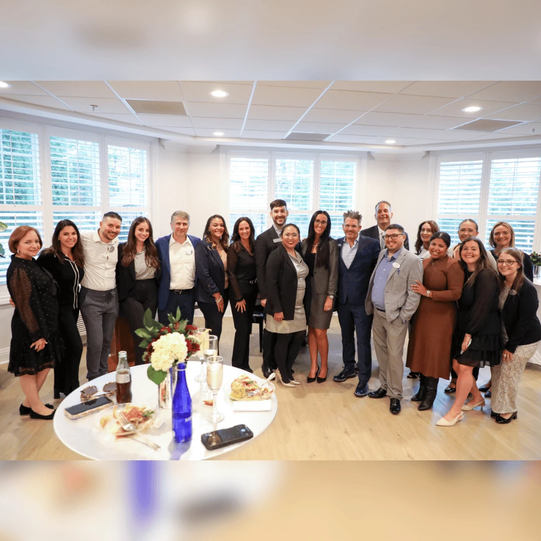 The team at The Bristal at Woodcliff Lake gathered with leadership from Ultimate Care Management to celebrate the unveiling of newly designed spaces