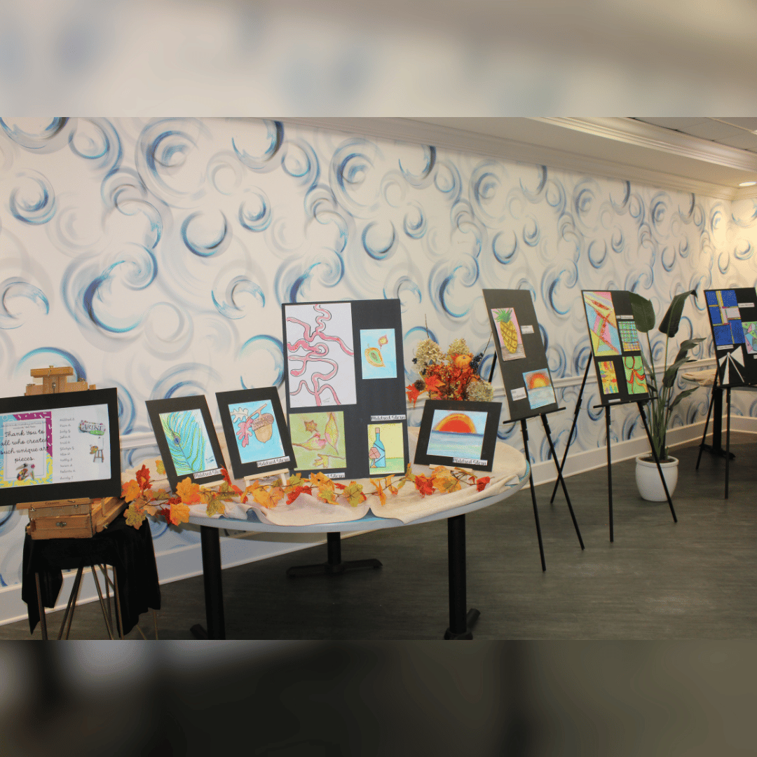 Art Show displaying work by assisted living residents in Jericho
