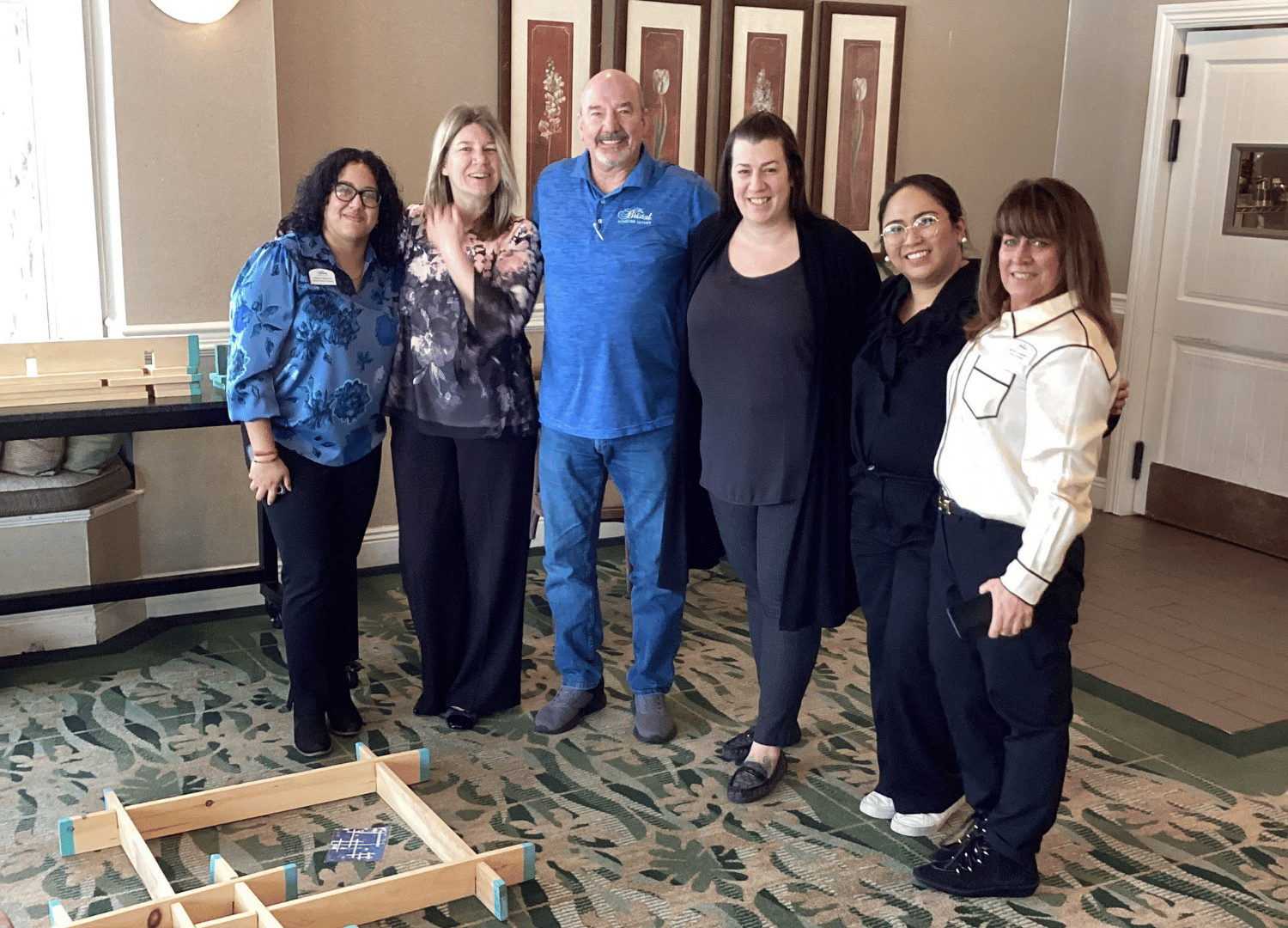 Following the event, leaders pose for a picture at The 2026 Leadership Summit for The Bristal Assisted Living communities