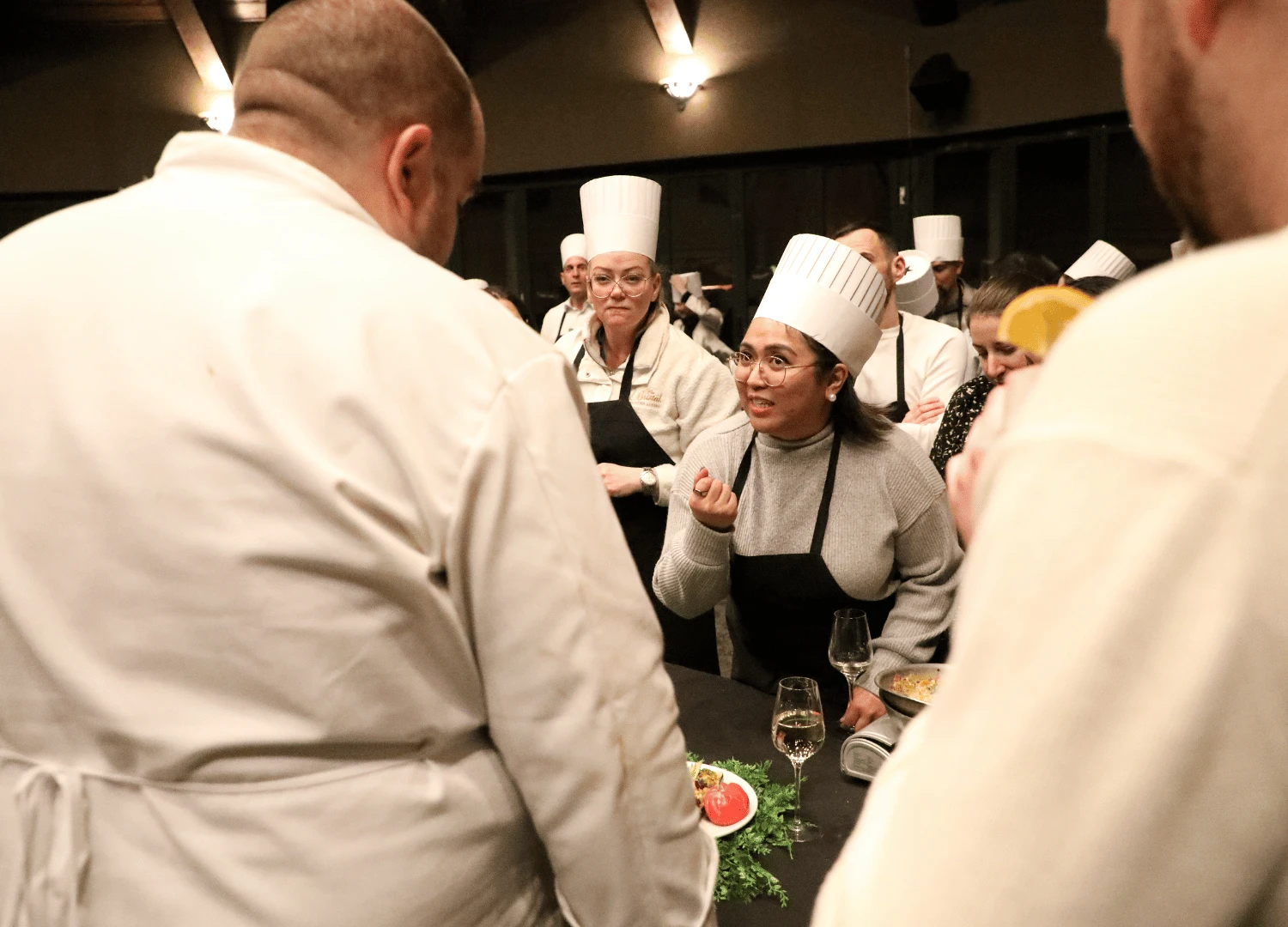 Team explains ingredients during Iron Chef challenge at summit