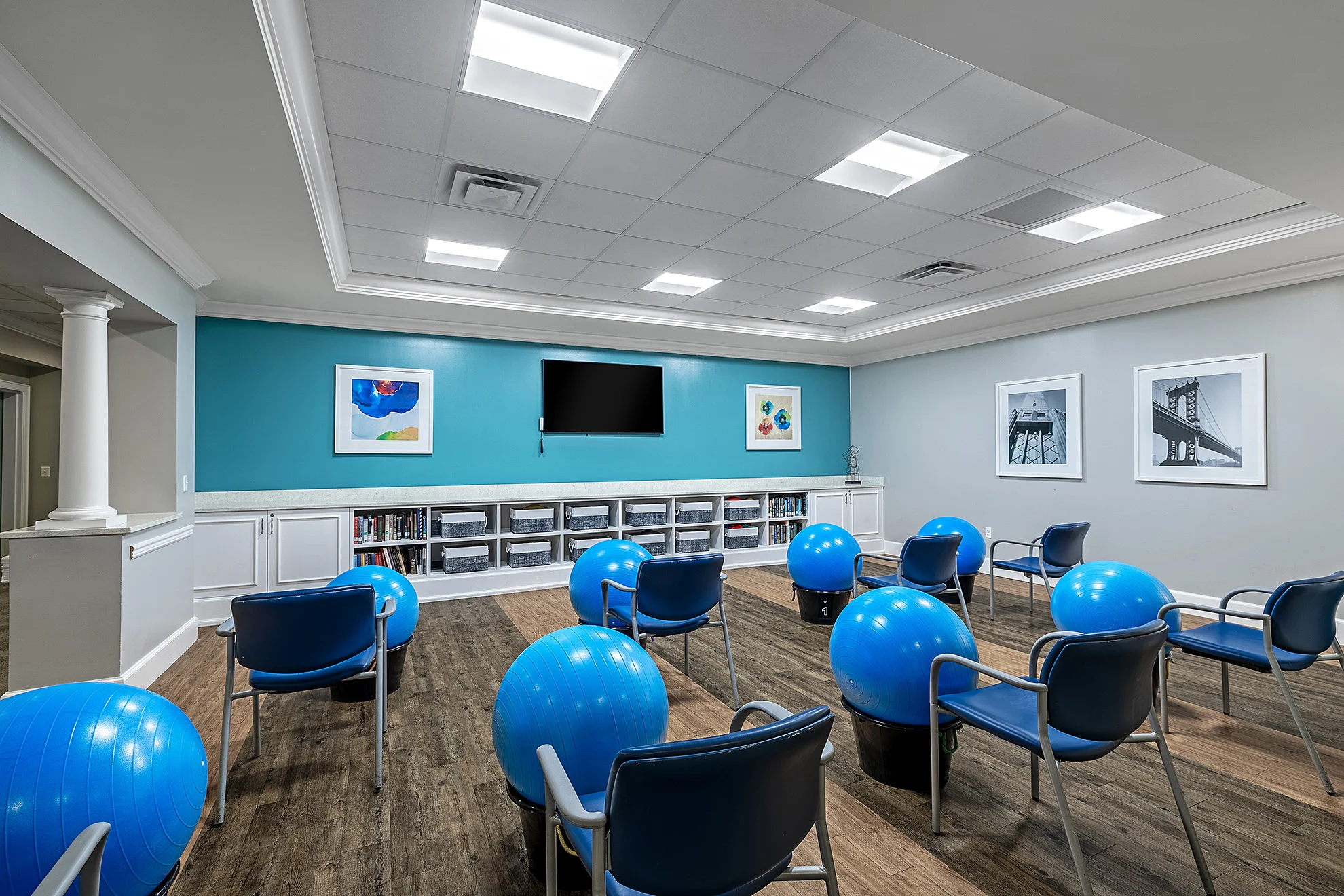 The Bristal at Lake Success_Activity Room with exercise equipment