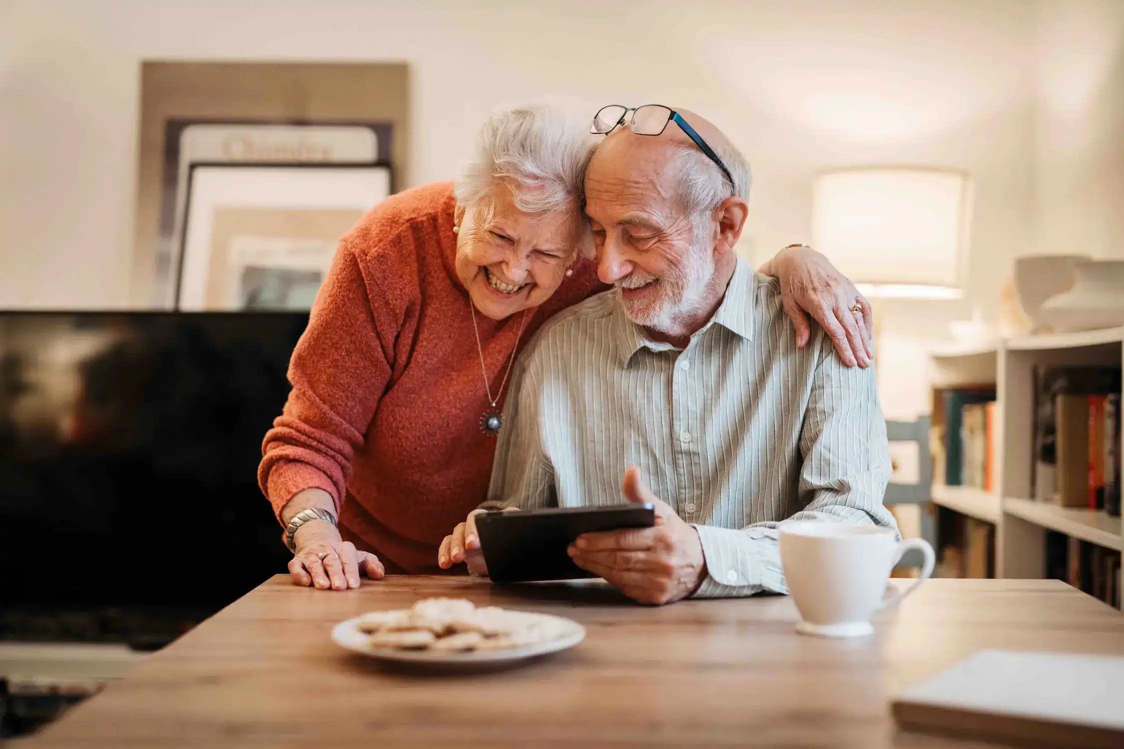 Senior couple smiling at The Bristal Assisted Living, North Woodmere, NY