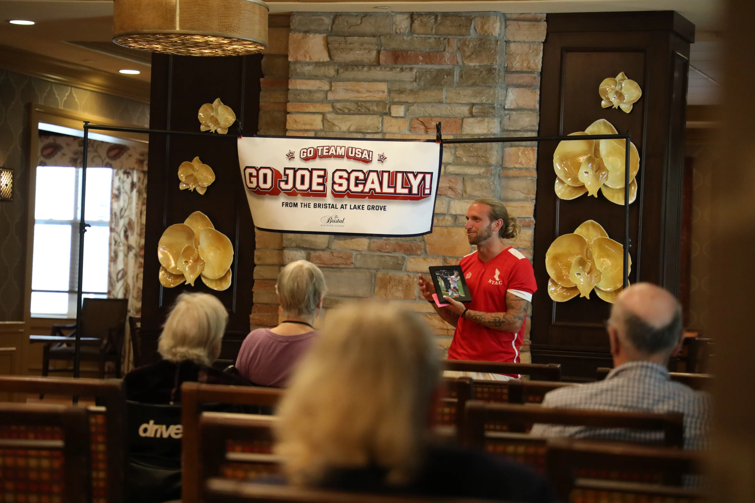 Dan Giorgi, Director of Coaching at OBEN Soccer Club, presenting at The Bristal at Lake Grove for the FIFA World Cup Watch Party