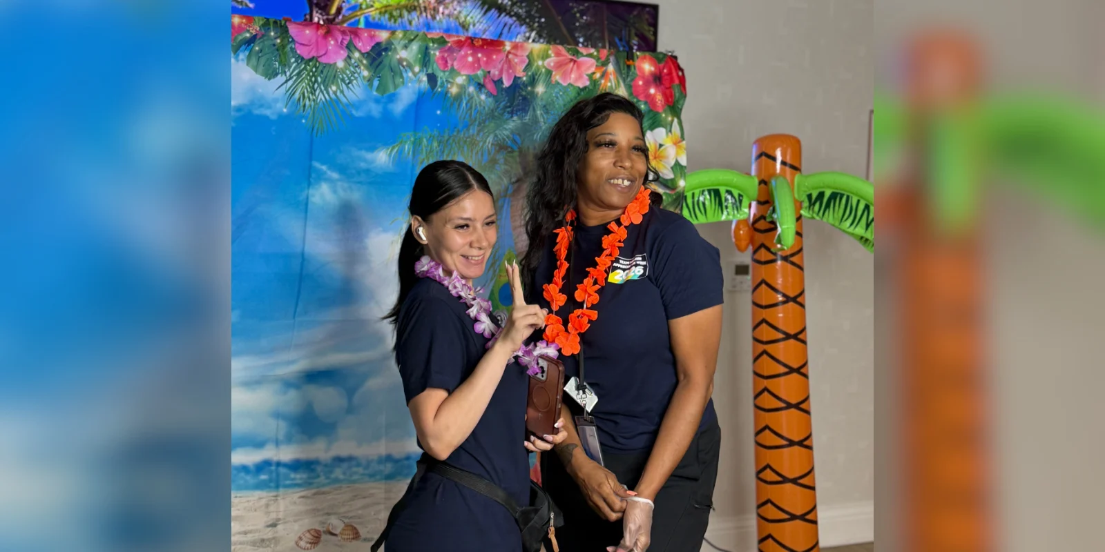Team Member Appreciation Week at The Bristal at Woodcliff Lake - team members pose for pictures dressed for a luau celebration