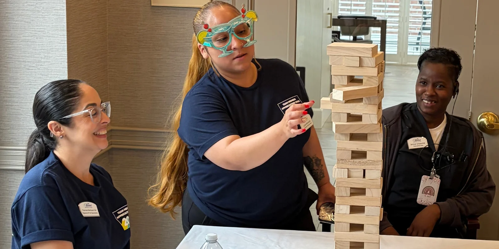 The Bristal at York Avenue Celebrates Team Week - team members play Jenga
