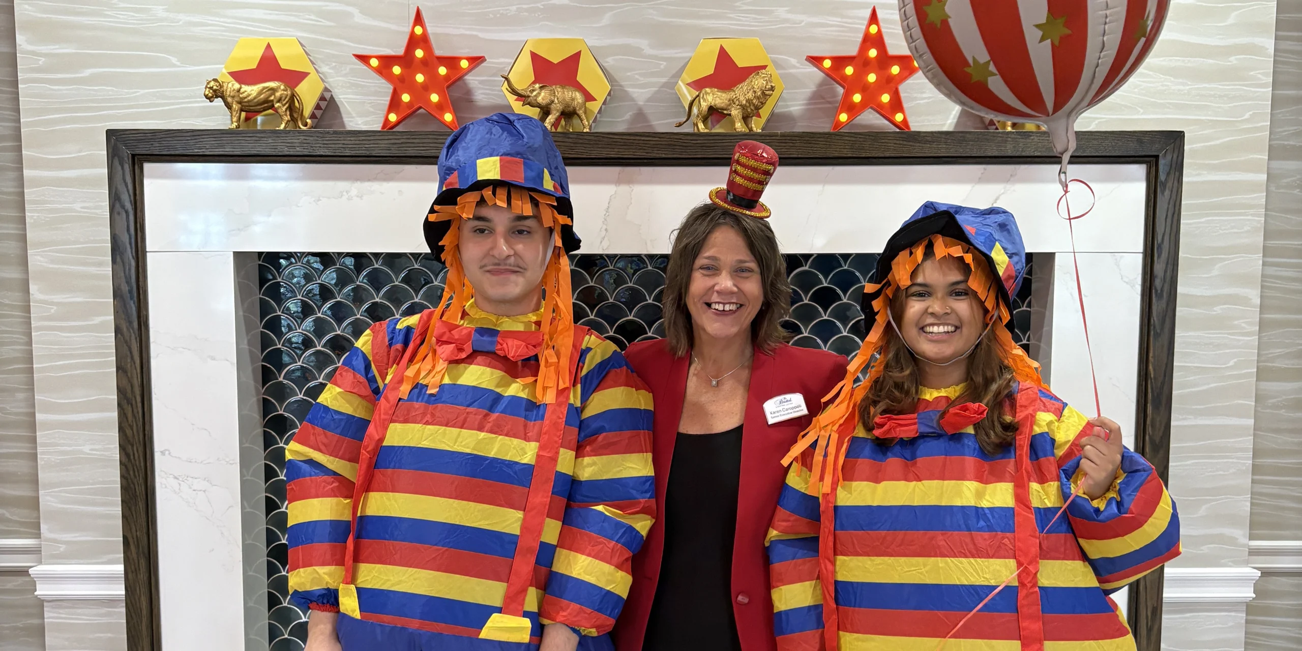 Grandparents Day at The Bristal at Mount Sinai - team members dressed in colorful carnival attire
